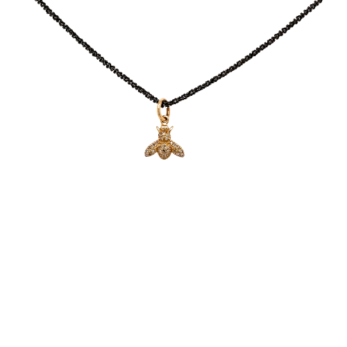 One yellow gold necklace featuring a bee filled with diamonds hanging on a black color chain