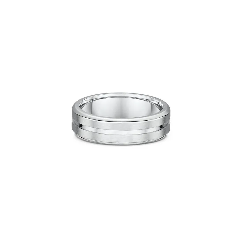 One silver band ring features a split or divided center design.