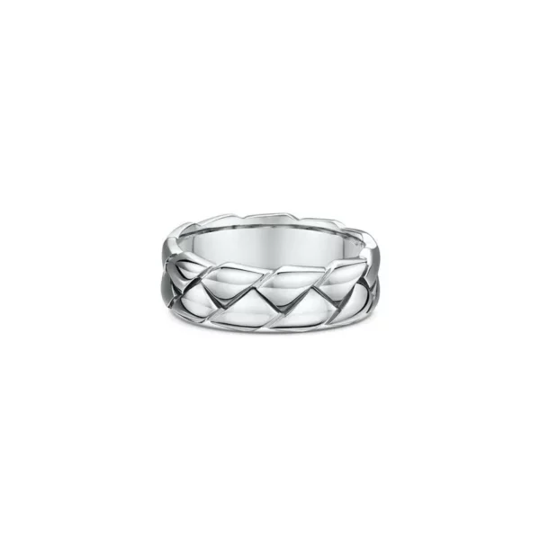 One silver band ring featuring a braided cut pattern along its band.