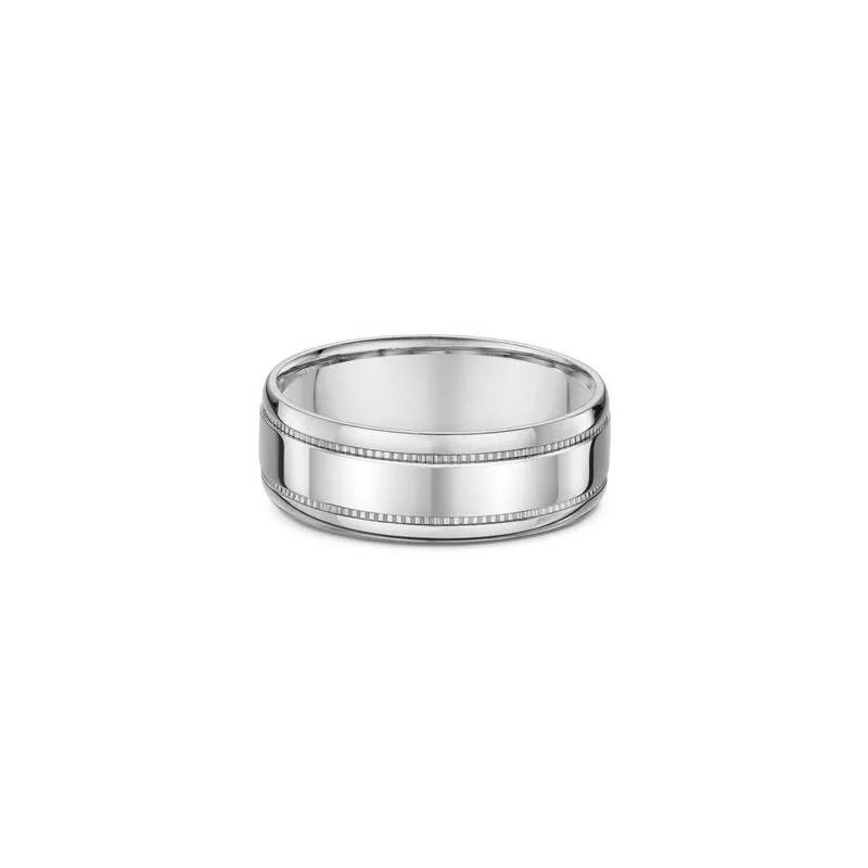 One silver band ring featuring a line design along its surface. The silver composition of the ring lends it a bright and reflective appearance, directly facing the camera.