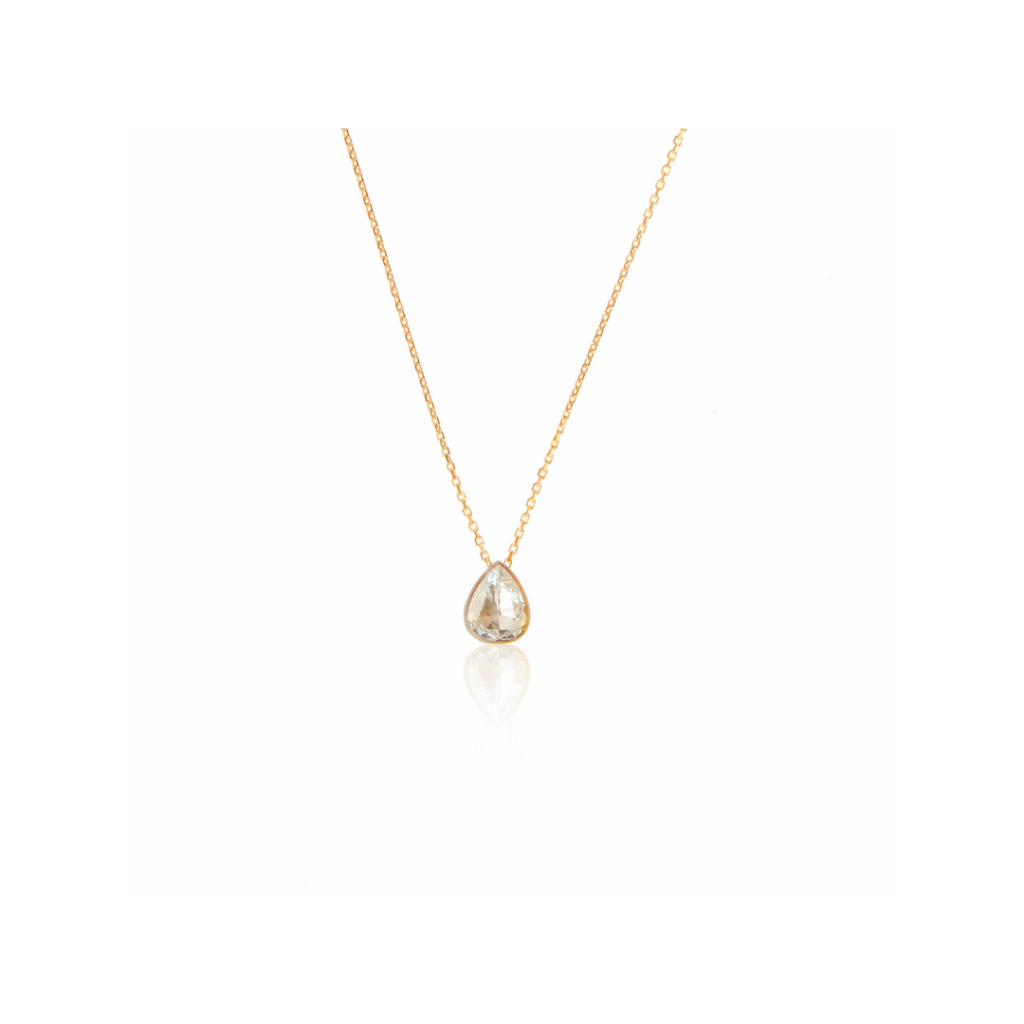 One yellow gold necklace. The necklace features a pear-shaped pendant adorned with cultured pearl.