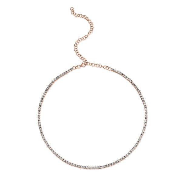 One rose gold tennis necklace. The necklace adorned with diamonds are set in a continuous line.
