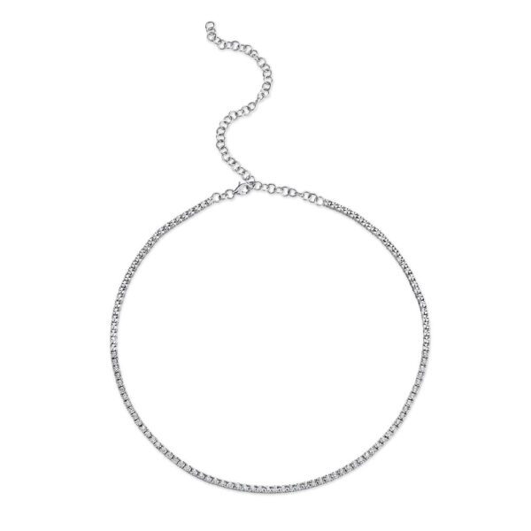 One white gold tennis necklace facing the camera. The necklace adorned with diamonds are set in a continuous line.