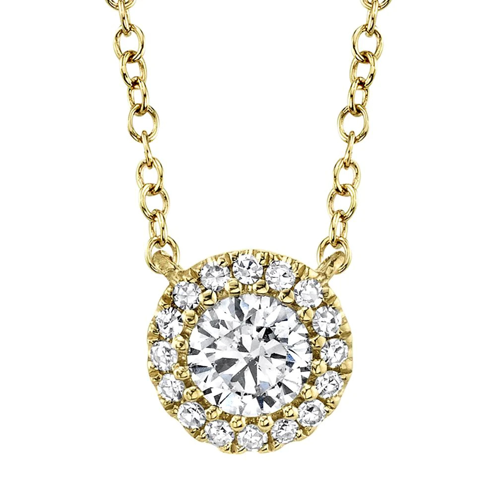One yellow gold necklace directly facing the camera. The necklace features a round pendant has center diamond surrounded by smaller side diamonds.