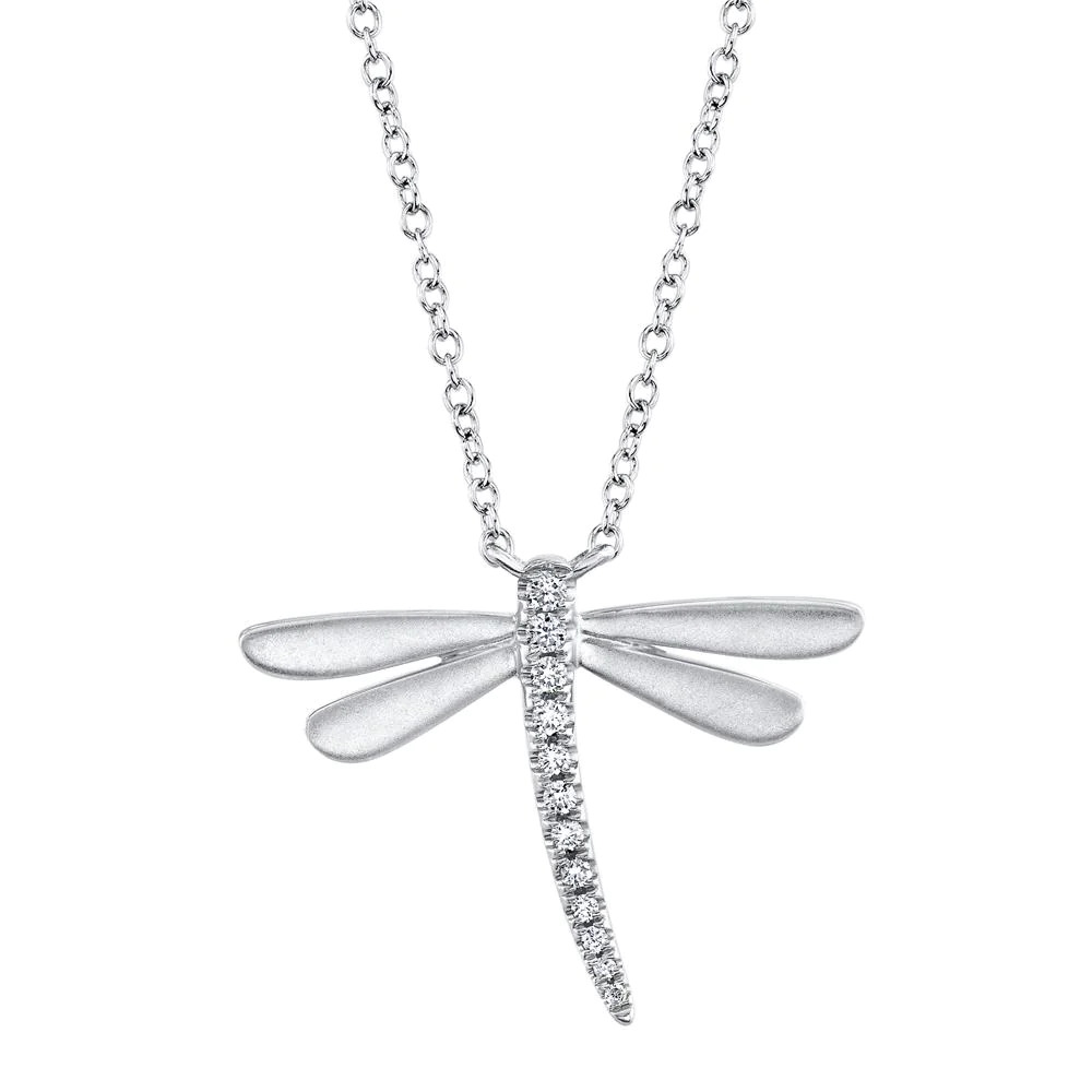 One white gold necklace. The pendant is dragonfly-shaped and is adorned with the diamond positioned within the body of the dragonfly.
