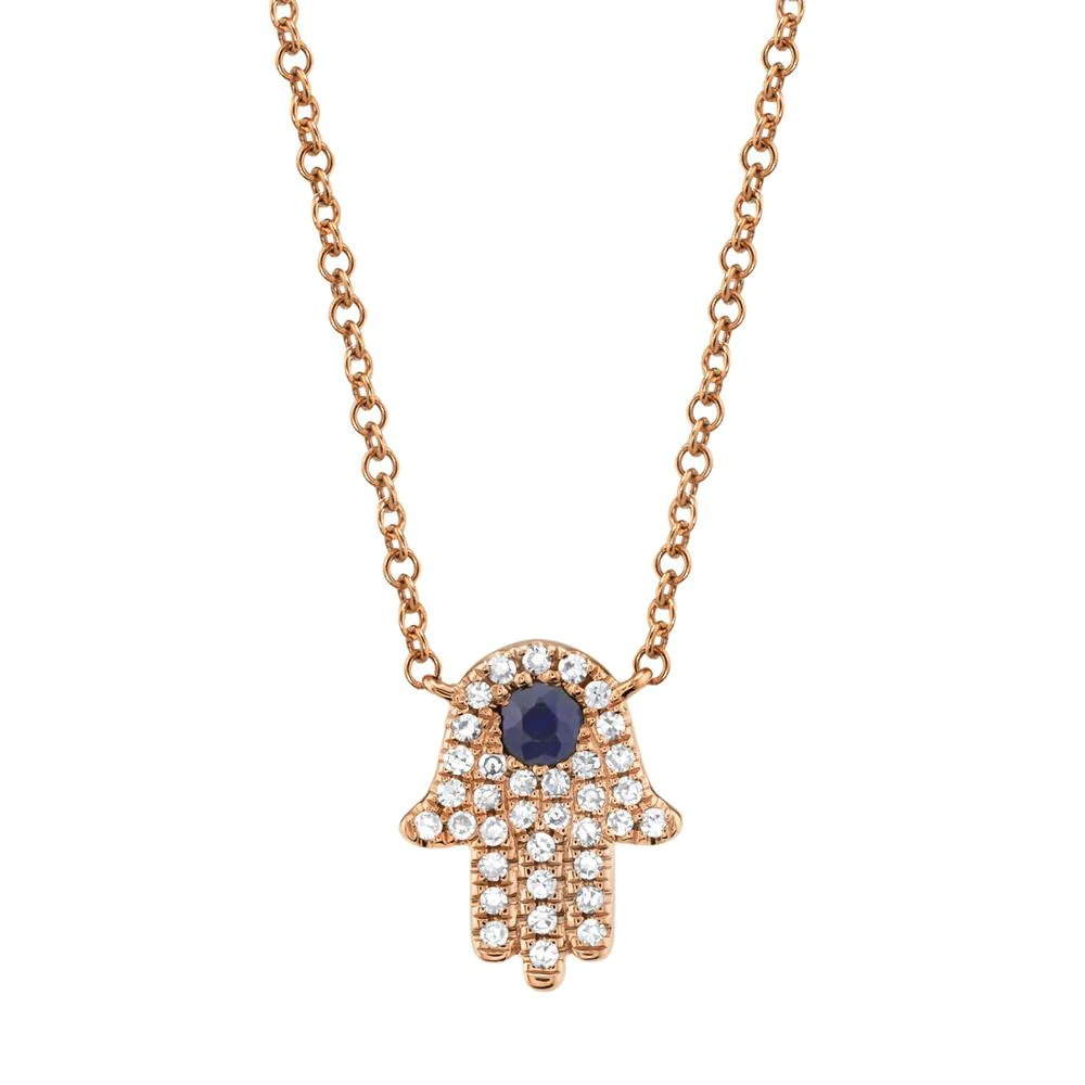One rose gold hamsa necklace. The Hamsa pendant is likely designed hand-shaped symbol and the blue sapphire stones are incorporated into the center of the pendant, surrounded by small diamonds.