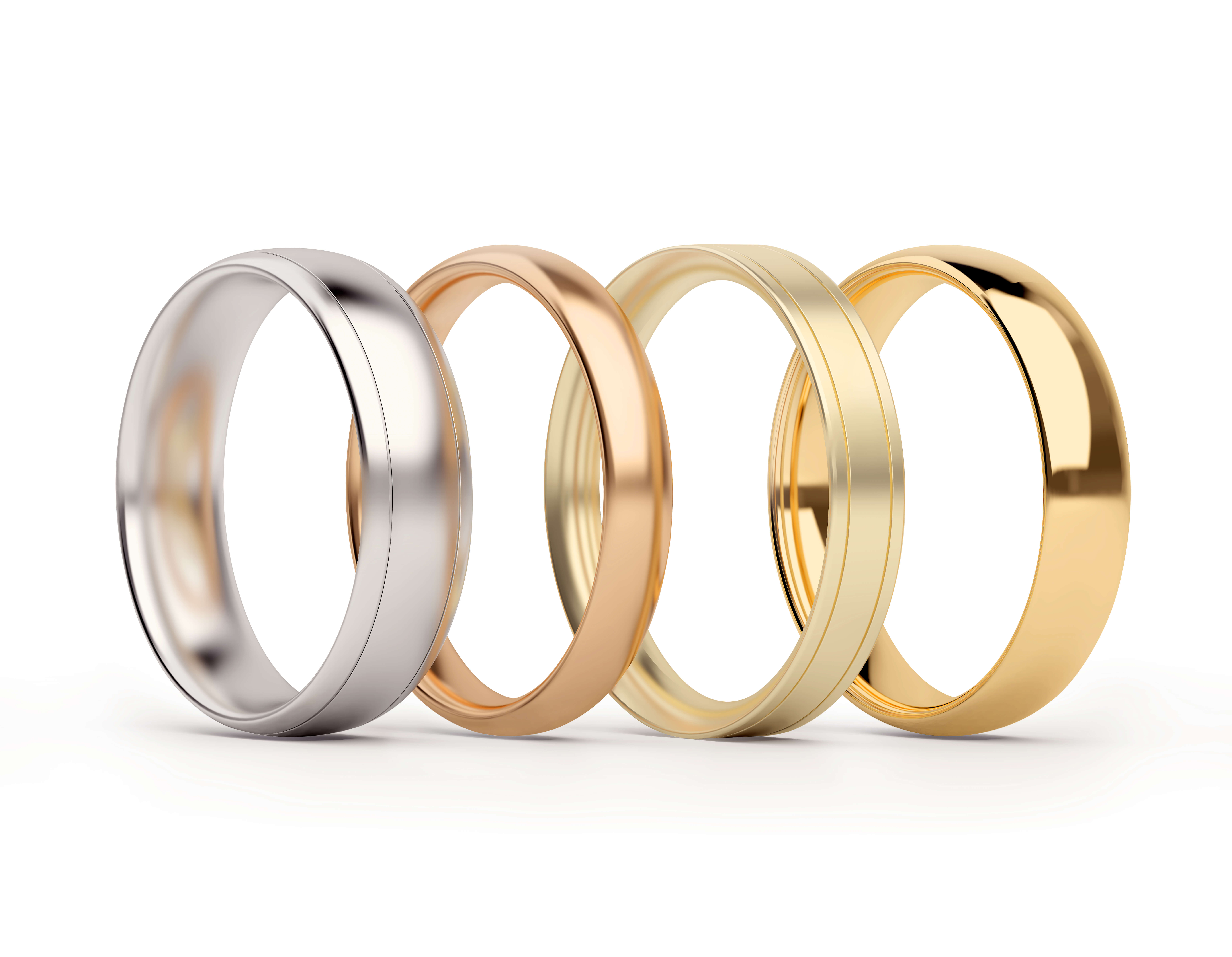 Four plated rings sets against a white background, with different colors of rose gold, white gold, yellow gold, and matte finished yellow gold.